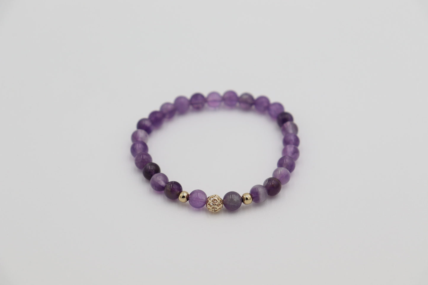 Simple. Powerful. Intentional.
Crafted with rich purple amethyst, this bracelet embodies dignity, resilience, and quiet confidence. Known for its protective and calming properties, amethyst encourages inner strength and clear thinking — a daily reminder of the power every woman carries within her.